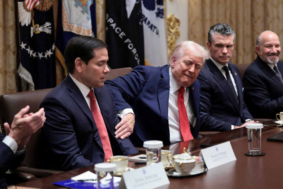 u s president donald trump reacts as secretary of state marco rubio speaks about israel and hamas agreeing on the first phase o