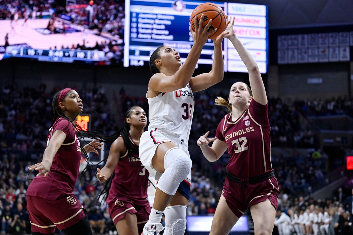 Fudd, Strong lead UConn past Florida State after unveiling the 2024-25 national championship banner