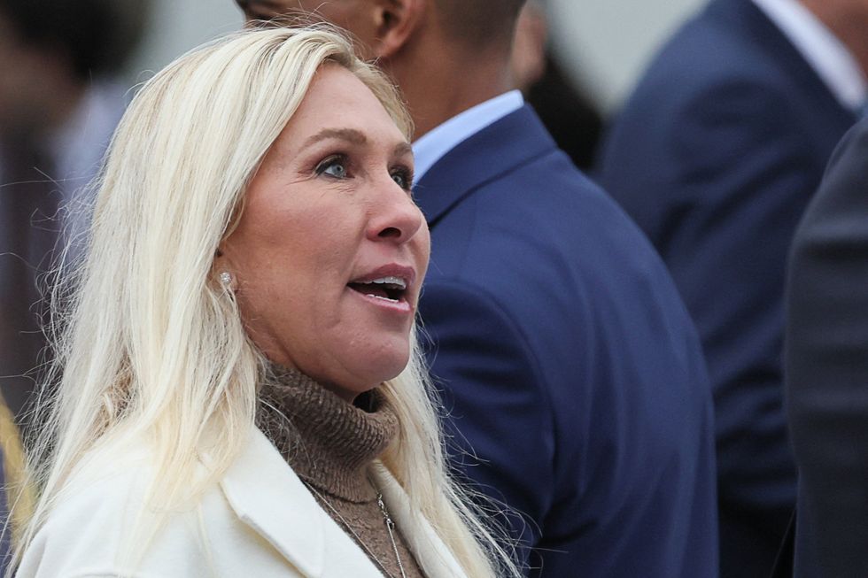 u s rep marjorie taylor greene r ga looks on ahead of president donald trump delivering remarks on tariffs in the rose gar